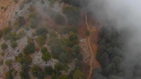 Drone Emerging Above Clouds Revealing Mountain Landscape Cinematic View Vídeos de archivo 331100568