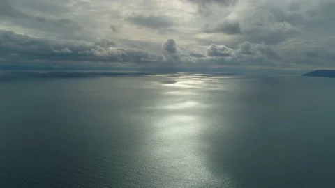 Drone epic time lapse Baikal lake dramatic clouds fast motion Nature Siberia 4k Stock Footage 142778497
