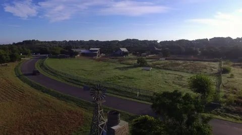 Drone Establishing Shot Fly into Central Texas Horse Stable at Sunrise with W Stock Footage 68072879