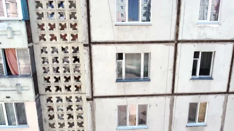 Drone exploration of seams between concrete panels at home 2 00000000 Stock Footage 157749790