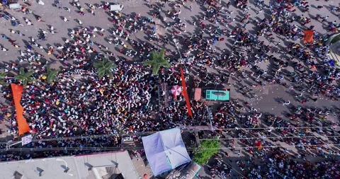 Drone eye level view of massive people celebrating during immersion of lord.. Stock Footage 340084296