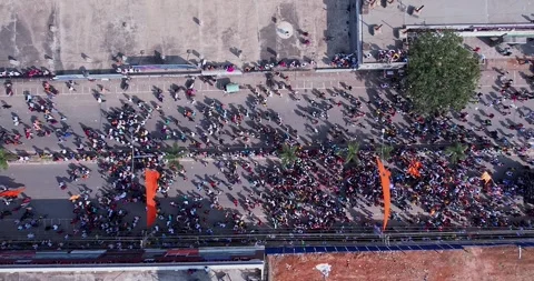 Drone eye level view of massive people celebrating during immersion of lord.. Stock Footage 340084306