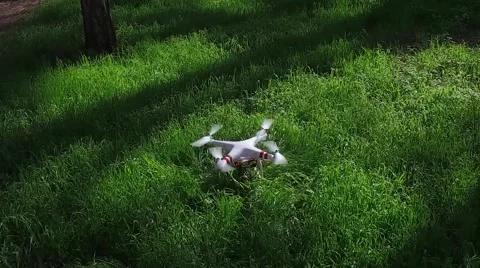 Drone fail. Quadro copter fell during takeoff  in grass. Stock Footage 67229977