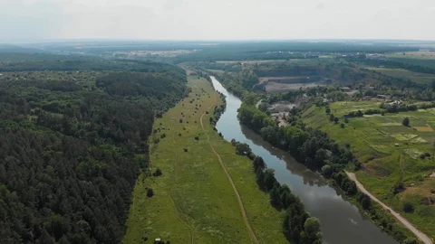 Drone Fast Flying Over River and Near Granite Quarry Forest Nature Stock-Footage 111734575