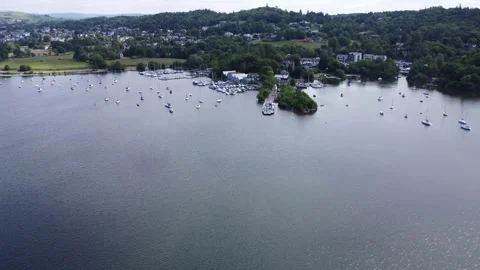 Drone files towards Bowness and passenger/car ferry Stock Footage 243096009