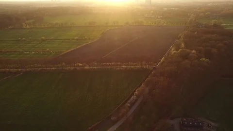 Drone filming beautiful dutch fields at sunset Stock Footage 75350810