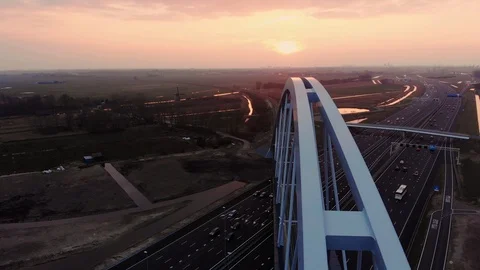 Drone filming finished bridge build over highway 4K  Video stock 87718503