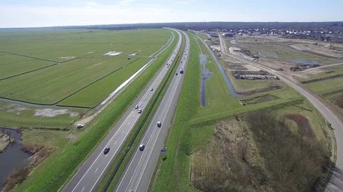 Drone filming highway traffic in The Netherlands Stock Footage