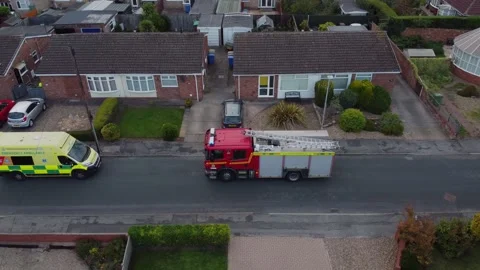 Drone. Fire engine and ambulance in urban street setting. Hull.UK 5.7.2025 Stock Footage 317938678
