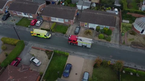 Drone. Fire engine and ambulance in urban street setting. Hull.UK 4.7.2025 Stock Footage 317940343