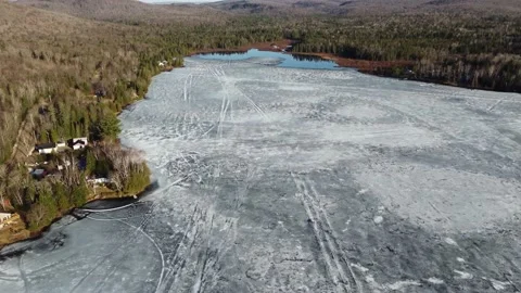 Drone Flew Over a Thawing Lake Stock Footage 157933197