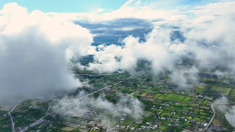Drone flew through clouds. River, green fields, houses and clouds Stock Footage 280343458