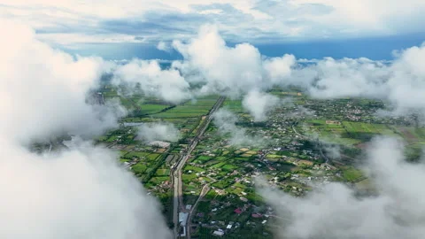 Drone flew through clouds. River, green fields, houses and clouds Stock Footage 280344628
