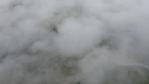 Drone flies above clouds and road to Dolomites mountain peaks. Alps, South Tyrol Vidéo 123161949