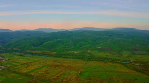 Drone flies above small town valley Stock Footage 132215256