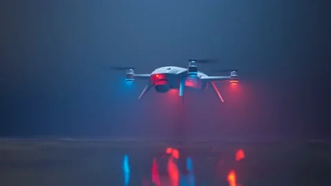 Drone flies above the water surface during the night. Seamless looping animation Stock-Footage 201244388