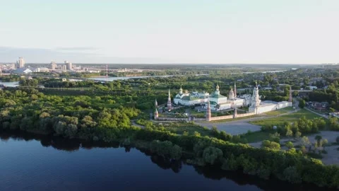 The drone flies across the river and you can see the monastery Stock-Footage 155884764