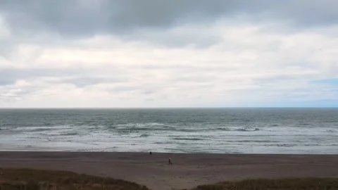 Drone flies along the path and flies out to the ocean, Ireland beach Stock Footage 267076363