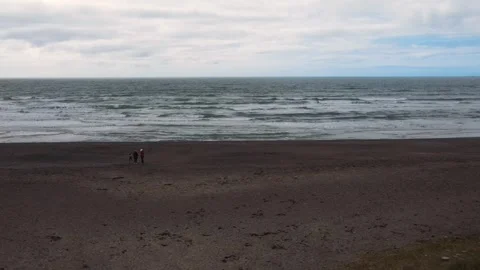 Drone flies along the path and flies out to the ocean, Ireland beach Stock Footage 267076613