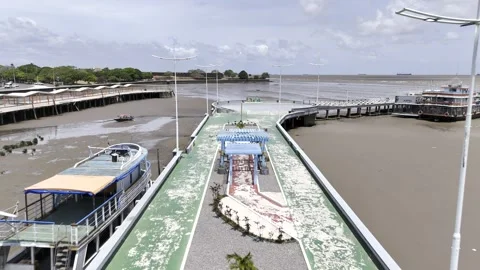Drone flies along Trapiche St Ines with the Amazon River at low tide Stock Footage 290931501