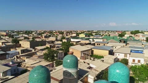 A drone flies around the Chor Minor, the Madrasah of Khalif Niyaz-kul. Old Stock Footage 277517243