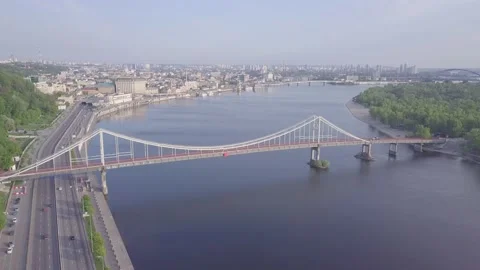 The drone flies back and opens a view of the city embankment Video stock 146987977