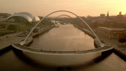 Drone flies back from Millennium Bridge to reveal Newcastle Skyline Stock Footage 275231159