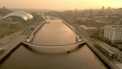 Drone flies back from Millennium Bridge to reveal Newcastle Skyline Stock Footage 275231237