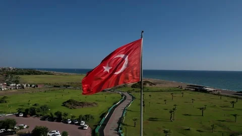 The drone flies back from Turkish flag drone shot 4k Stock Footage 255913046