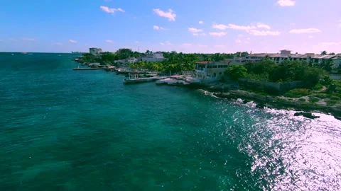 Drone Flies Backward and Forward over a Pacific Ocean Resort Video stock 347152731