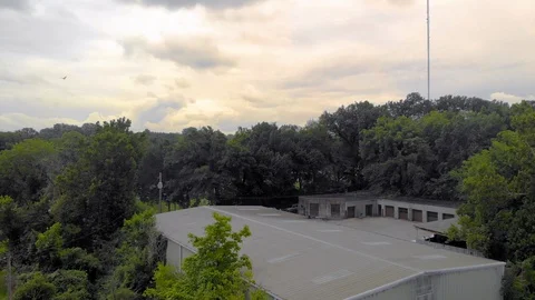 Drone flies backward over empty train bridge Stock-Footage 128826040