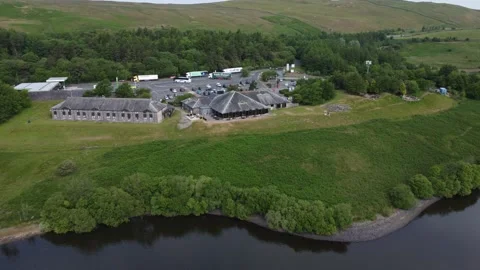 Drone flies backwards to show Killington motorway (freeway) services, UK Stock Footage 243487072