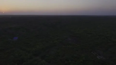 Drone flies backwards at sunset in Zanzibar, Tanzania Stock Footage 344166074