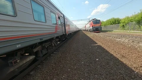 Drone flies between two passenger trains Vídeo Stock 229528934
