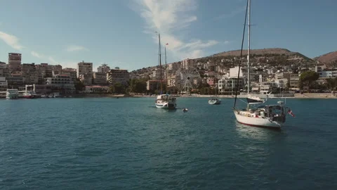 Drone flies between two ships, air Saranda Stock Footage 165627508