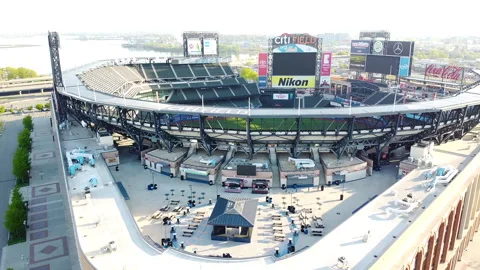 Drone flies in Citifield to grass Video stock 131558755