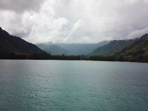 Drone flies in close at Kahana Stock Footage 80972933