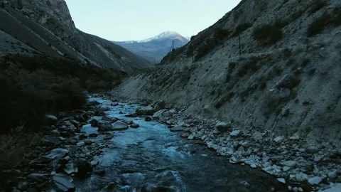 Drone flies close over mountain river Stock Footage 171301559
