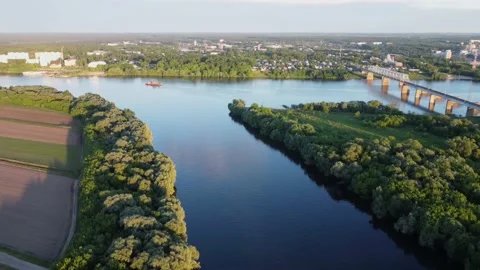 The drone flies to the confluence of two rivers Stock Footage 155884885