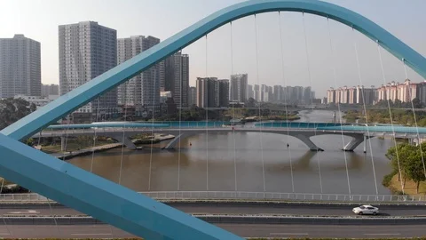 The drone flies dangerously through the extensions of the cable-stayed bridge. Stock Footage 118287656