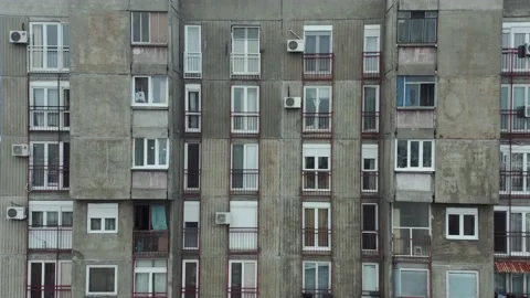 Drone Flies Up a Gray Brutalist Facade Video stock 148474782