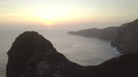 The drone flies at a height and captures the sunset. Stock Footage 155987522