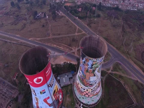 Drone flies high above and orbits Soweto Towers, Johannesburg 스톡 동영상 80722588