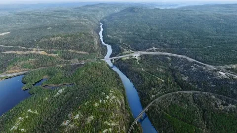 Drone flies at high altitude over the Little Peak River, Ontario, Canada Video stock 157625890