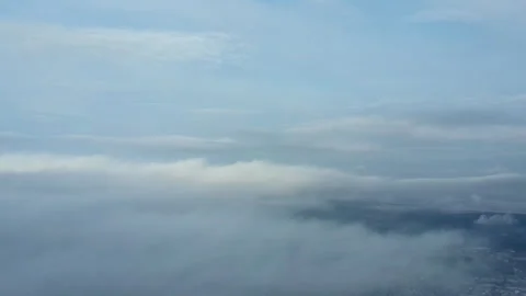 Drone flies high back in blue sky through fluffy clouds. Nature. Dramatic scene Stock Footage 293670661