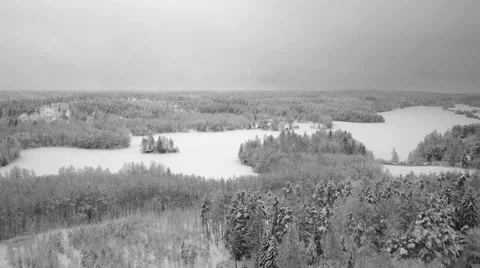 Drone flies high in low contrast frosty country side lake winter nature view Stock Footage 46712648