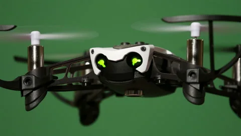 Drone flies indoor on green screen, close up view Stock Footage 99459480