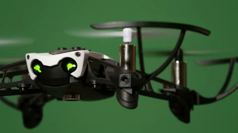 Drone flies indoor on green screen, close up view, dolly move Stock Footage 99459604