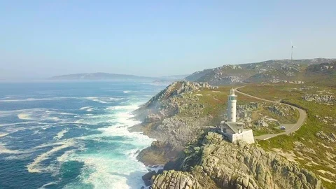 Drone flies to the lighthouse in the ocean Stock Footage 93438437