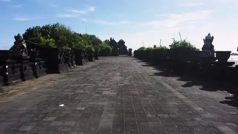 Drone flies low above the ground to the temple Stock Footage 152205555